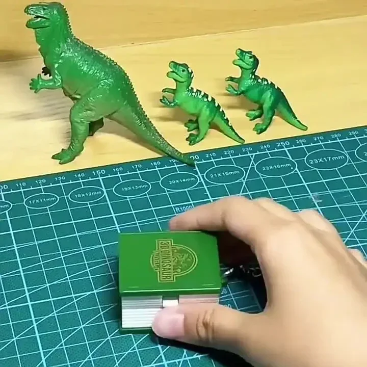 Jurassic Dinosaur Folding Book Keychain - Image 7
