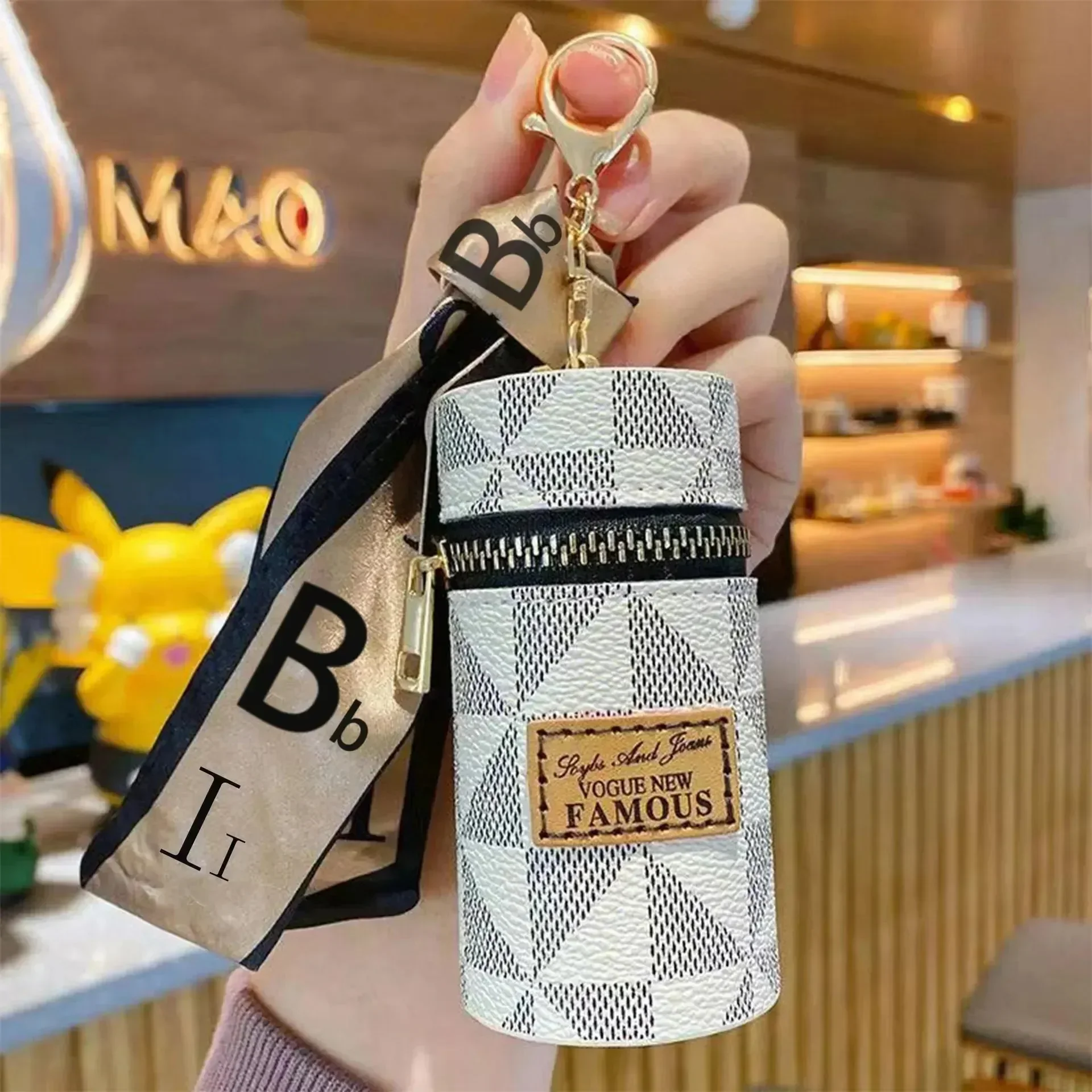 Luxury Monogram Coin Pouch Keychain - Image 11