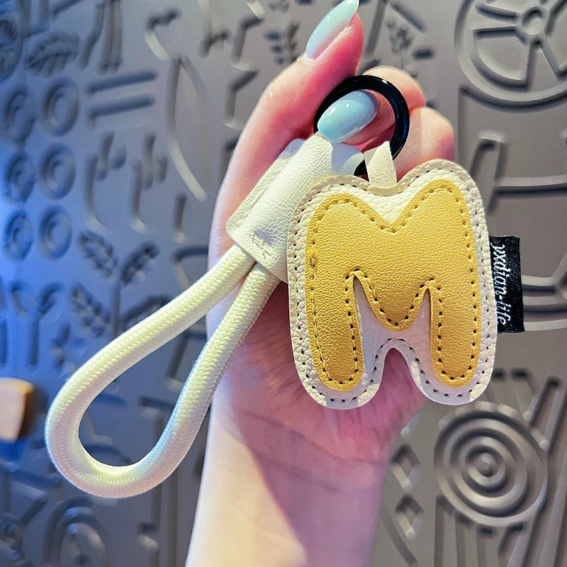 Signature Style Leather Letter Keychain - Image 14